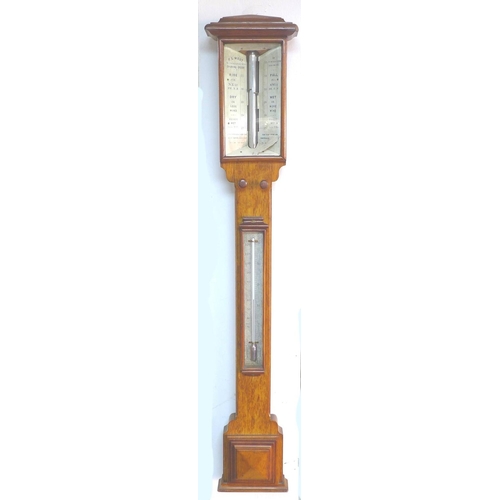 363 - A Victorian oak cased stick barometer, by West of London, with engraved ivory dial, 17.5 by 9 by 103... 