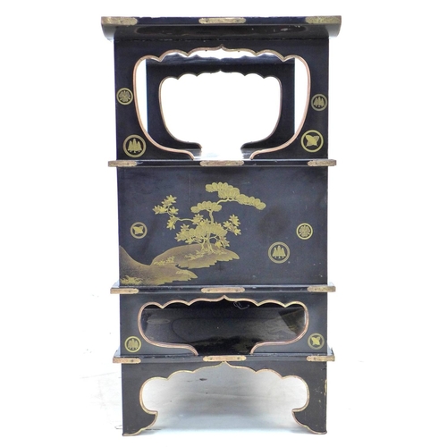 369 - A low Japanese black lacquer shelf unit, Meiji period, with engraved copper mountings, decorated in ... 