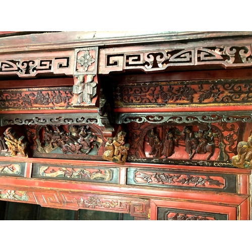 370 - A Chinese wedding bed, Qing Dynasty, late 19th / early 20th century, with carved, painted, and gilt ... 