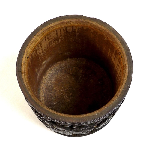 4 - A Chinese bamboo brush pot, bitong, Qing Dynasty, late 19th century, carved in relief with four pane... 