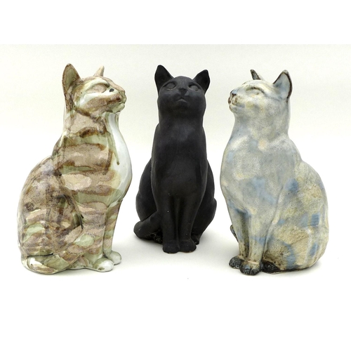 40 - A group of three Northshore Ceramic cats, all the same casting but of differing colours and glaze fi... 
