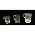 Three George III and Victorian glass Christening and commemorative tankards, each with acid etched i... 