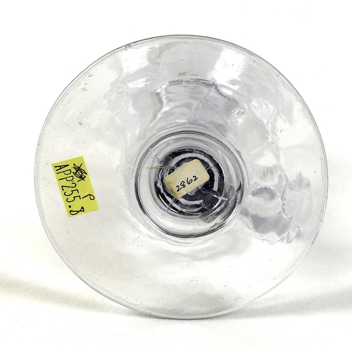 46 - A 19th century clear glass lace maker's oil lamp, with spherical holed top above a drip pan, above a... 