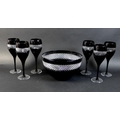 A set of six modern Waterford wine glasses, deigned by John Rocha, each with black flashed surface a... 
