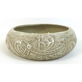 William Oram Trivett (British, 1872-1955), ceramic bowl, signed 'W.O. Trivett', with relief decorati... 