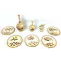 Eight pieces of Victorian Royal Worcester blush ivory wares, all decorated with hand painted flowers... 