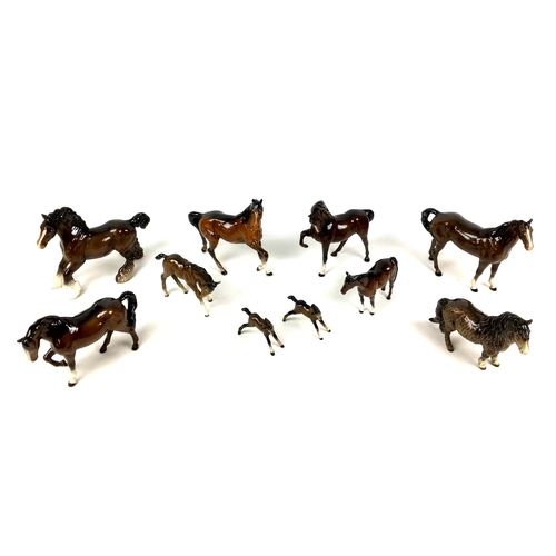 63 - Ten Beswick horse and pony figurines, comprising a shire horse 26 by 10 by 21cm high, a Chestnut stu... 