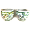 A pair of Chinese famille verte style jardinieres or fish bowls, late 20th century, with Greek key p... 