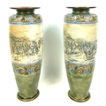 Hannah Bolton Barlow (British, 1851-1916) for Royal Doulton Lambeth, a pair of stoneware vases, deco... 