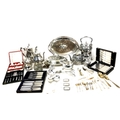A collection of silver plated items, including three spirit labels, a spirit kettle on stand, three ... 
