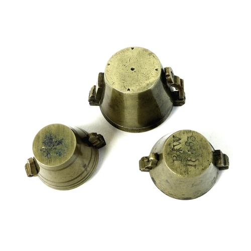 89 - A group of three Continental brass nested cup weights, made in Nuremberg comprising seven weight set... 