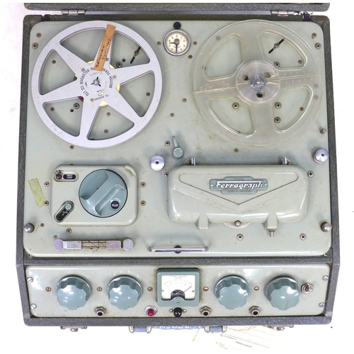 95 - A vintage Ferrograph reel to reel recorder, in grey carry case, 45 by 44 by 25cm, together with The ... 
