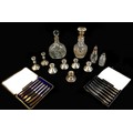 A collection of George V and later silver candlesticks and other wares, comprising a pair of ERII ca... 
