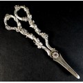 A pair of Victorian silver grape scissors, with ornate handles decorated with vines and grapes, H J ... 