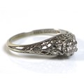 An 18ct white gold and diamond solitaire ring of Art Deco design, marked Sheppard, possibly for A G ... 