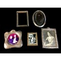 Five George V and later silver mounted photograph frames, comprising a George V oval frame, Charles ... 
