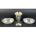 A 19th century French silver cup, 8 by 7.8 cm high, 3.7toz, together with two silver bon bon dishes ... 