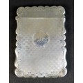 An early Victorian silver card case, with shaped outline, engraved C scroll and foliate decoration w... 