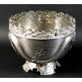 A Chinese Export silver punch bowl by Wang Hing & Co, circa 1900, the body decorated in relief with ... 