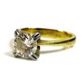 A diamond and 18ct gold and white gold solitaire ring, the diamond of approximately 1ct, approximate... 