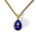 A Victor Mayer for Faberge enamel and 18ct gold egg pendant, the cobalt blue enamel with fleur de li... 