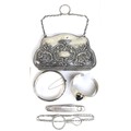An Edwardian silver evening purse, complete with finger loop and chain, Samuel M Levi, Birmingham 19... 