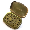 A George III silver vinaigrette, of octagonal form with and engraved thistle to its top, a parcel gi... 