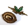 An early to mid 20th century 14ct gold butterfly brooch with jade wings 5.3cm wide, 5.3g, and a yell... 