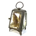 A French early 20th century brass pocket watch display case, with bevelled glass sides and to hinged... 