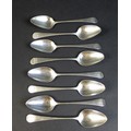 Eight George III silver old English pattern dessert spoons, with monogram possibly 'JMJ' to terminal... 