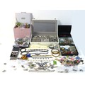 A large collection of costume jewellery including silver earrings, pendants, necklaces, chains, and ... 