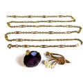 A group of 9ct gold jewellery comprising an amethyst fob, with pierced scroll mounts, stone 20.2mm d... 