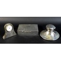 A group of three silver items, comprising a capstan inkwell, Stuart Clifford & Co., London 1912, 14.... 
