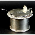 A William IV silver mustard pot, monogrammed lid with shell form thumb piece, gadrooned rim, blue gl... 