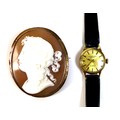 A 19th century cameo brooch, with the profile portrait of a lady in a neoclassical style, with yello... 