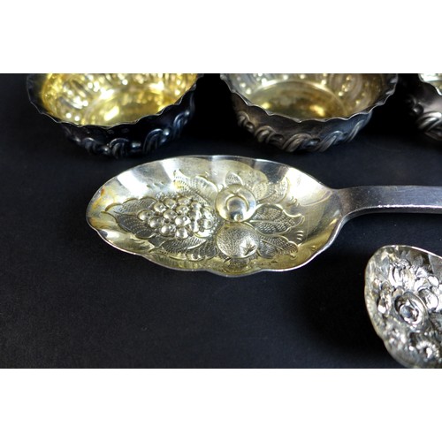 96 - A group of Victorian and later decorative silver comprising four bonbon dishes, of swirl gadrooned d... 