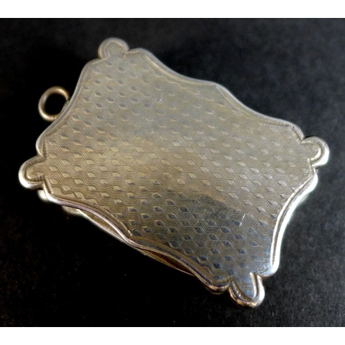 40 - A Victorian silver vinaigrette, of shaped rectangular form, with wave engine turned decoration to th... 