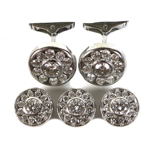 414 - A pair of gentleman's 18ct white gold and diamond cufflinks, together with three matching shirt stud... 