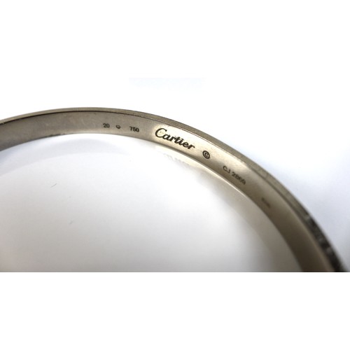 413 - A Cartier 18k white gold 'LOVE' bracelet, circa 2005, a/f damaged and with replacement screw, decora... 