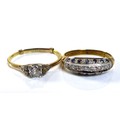 An 18ct gold and diamond solitaire ring, the central diamond of approximately 0.3ct, approximately 4... 