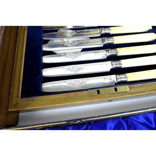 9 - A group of silver plated wares, comprising a Victorian set of fish servers, with carved ivory handle... 