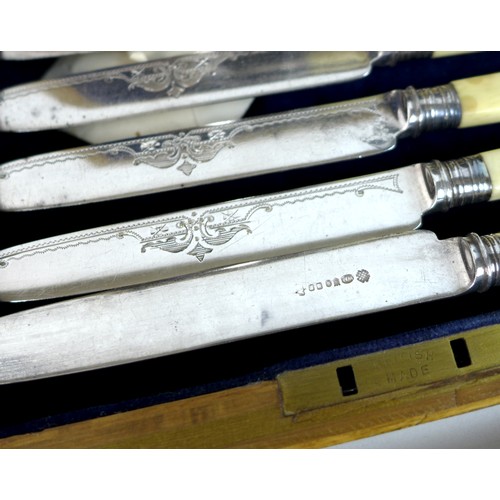 9 - A group of silver plated wares, comprising a Victorian set of fish servers, with carved ivory handle... 