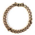 A 15ct rose gold kerb link bracelet, 17cm long, 11.4g.
