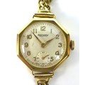 A Rotary 9ct gold lady's wristwatch, circa 1960, octagonal case, circular silvered dial with gold Ar... 