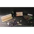 A large collection of costume jewellery, including coral style necklaces, faux pearl necklaces, an a... 