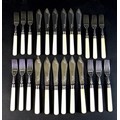 A set of Edward VII silver fish eaters, comprising twelve forks, 18.5cm, and twelve knives, 21cm, al... 