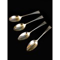 Two pairs of silver table spoons, Old English pattern, comprising a George III pair, terminals engra... 