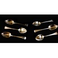 A set of five plus one George III silver dessert spoons, old English pattern, all with terminals eng... 