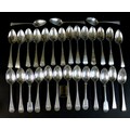 A collection of thirty Georgian and Victorian silver dessert spoons, comprising a George III old Eng... 