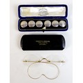 A pair of unmarked gold framed spectacles, each lens 3.9 by 3.5cm, 2.15cm between lenses, testing as... 